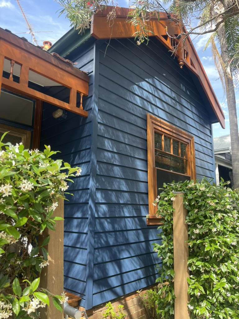 Blue weatherboard corner detail