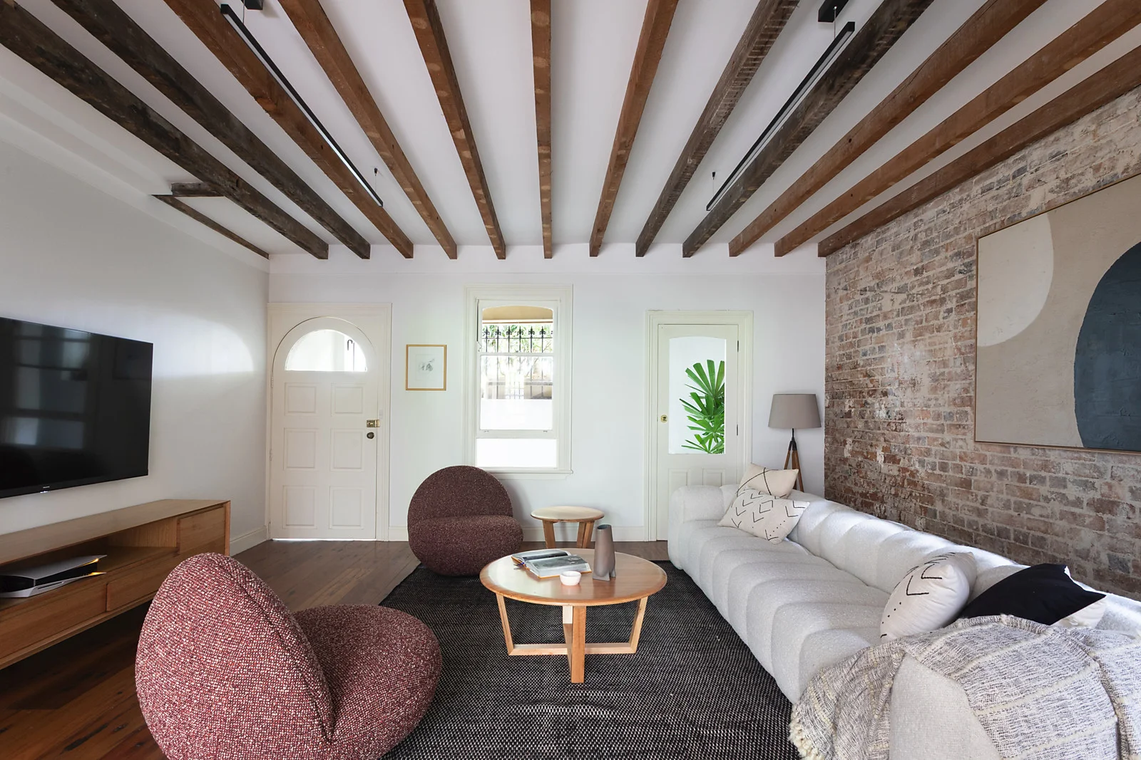 Living room with exposed timber ceiling beams
