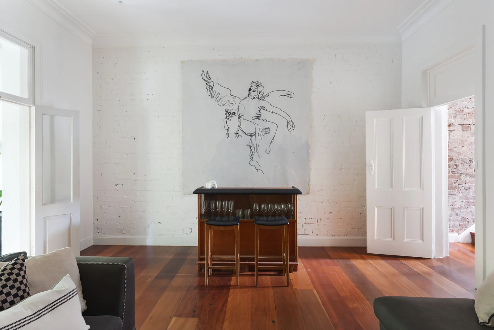Art wall with brick and bar area