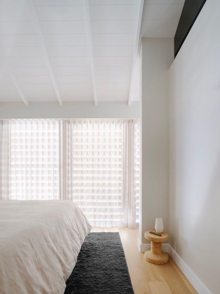Master bedroom — vaulted painted timber ceiling